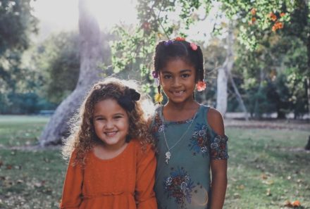 Adopted sisters smiling together