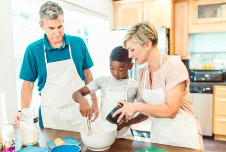 Adoption family baking together