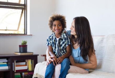 mom and son smiling